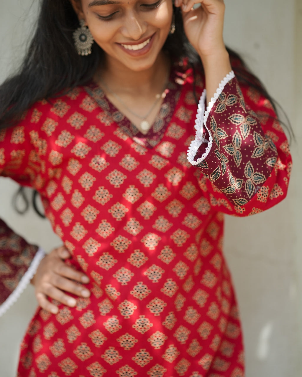 Red Ajrakh Print Cotton Kurthi with Bell Sleeves and Lace Trim
